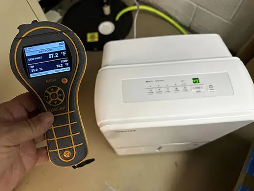 Moisture meter and dehumidifier